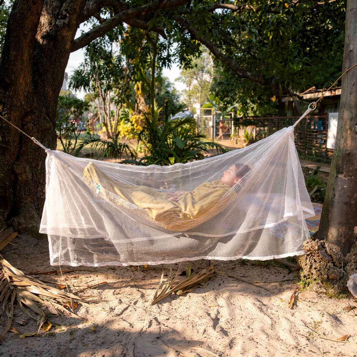Mosticare Amaca treated hammock net draped over a hammock